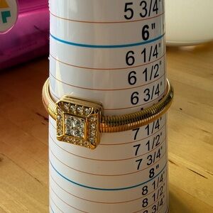 Elegant Gold Tone Bracelet with Crystal Accents